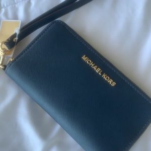 Brand NEW Authentic Michael Kors wallet/clutch . Navy blue